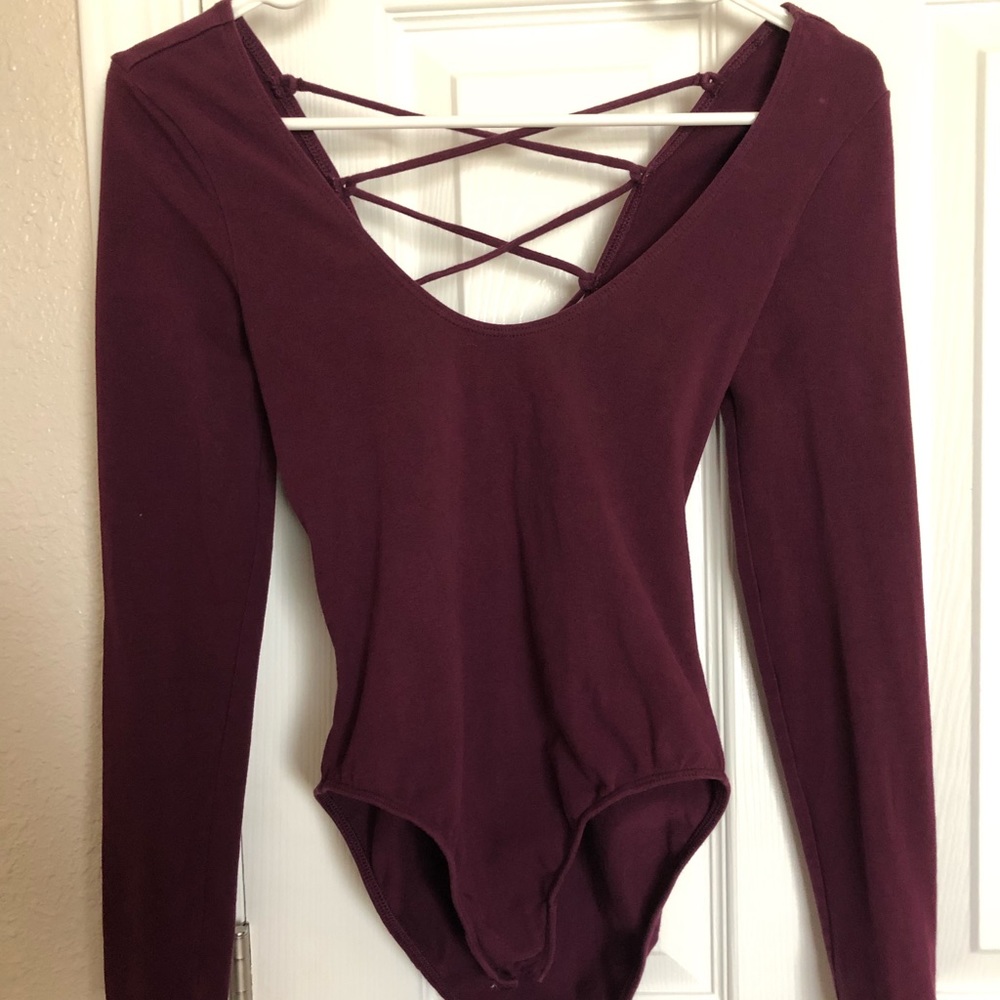 Burgundy purple bodysuit.